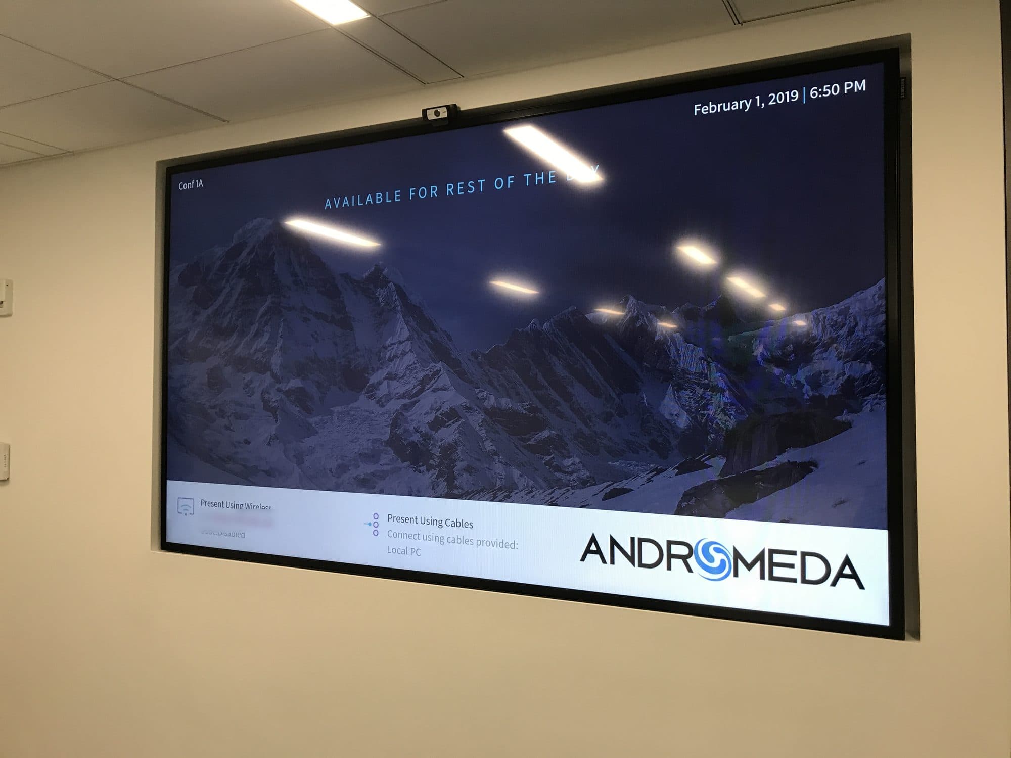 A conference room display at Andromeda Advantage headquarters, showing the room free between meetings